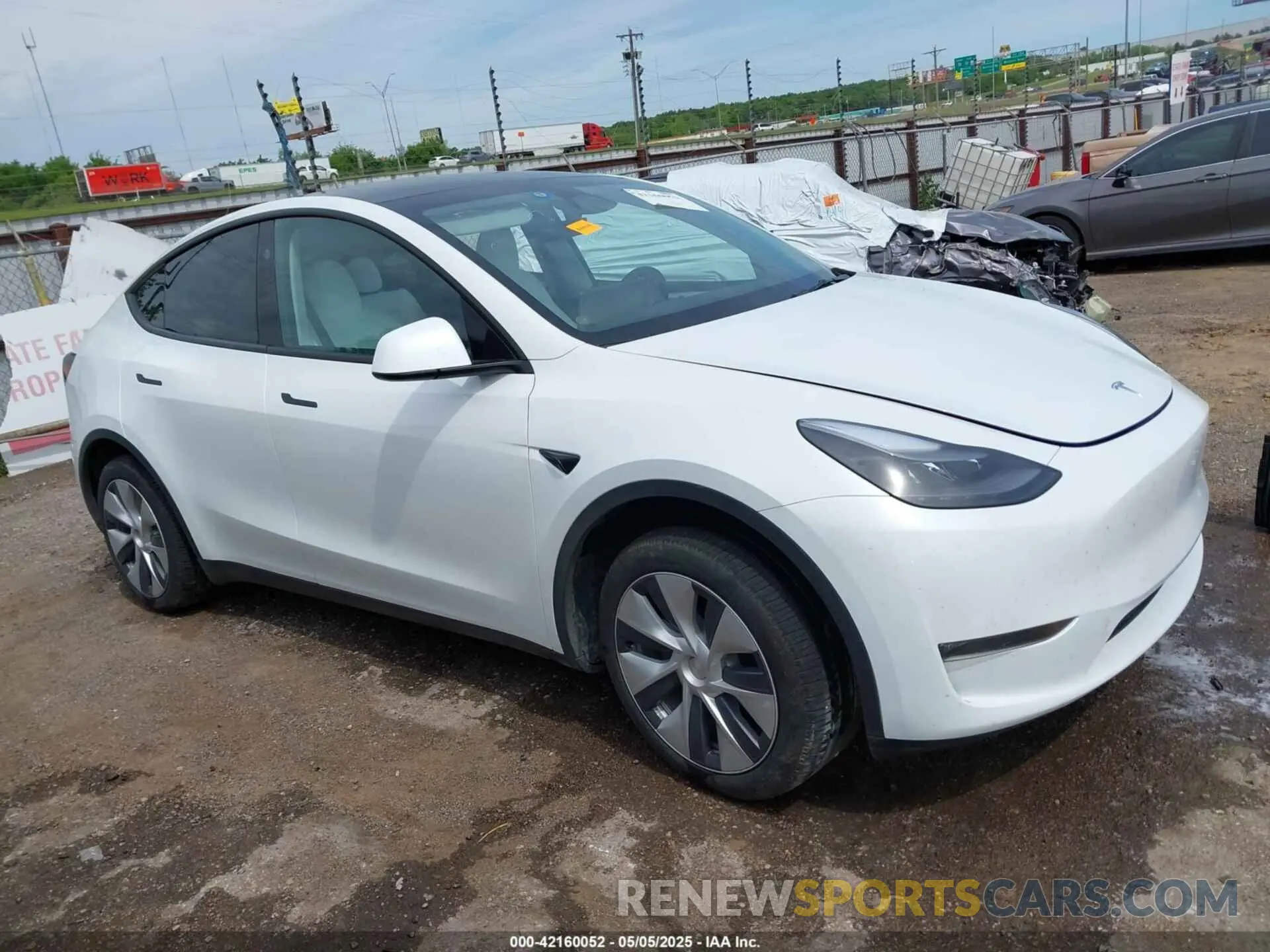 12 Photograph of a damaged car 7SAYGDEE2PA192205 TESLA MODEL Y 2023