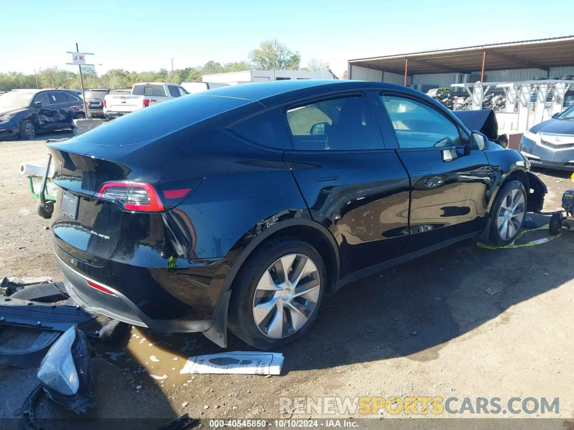 4 Photograph of a damaged car 7SAYGDEE2PF754638 TESLA MODEL Y 2023