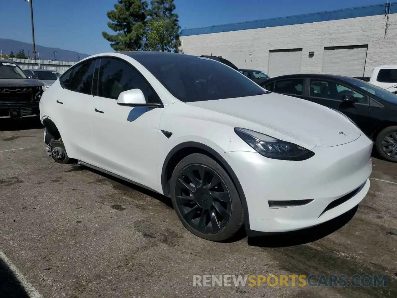 4 Photograph of a damaged car 7SAYGDEE4PA070770 TESLA MODEL Y 2023