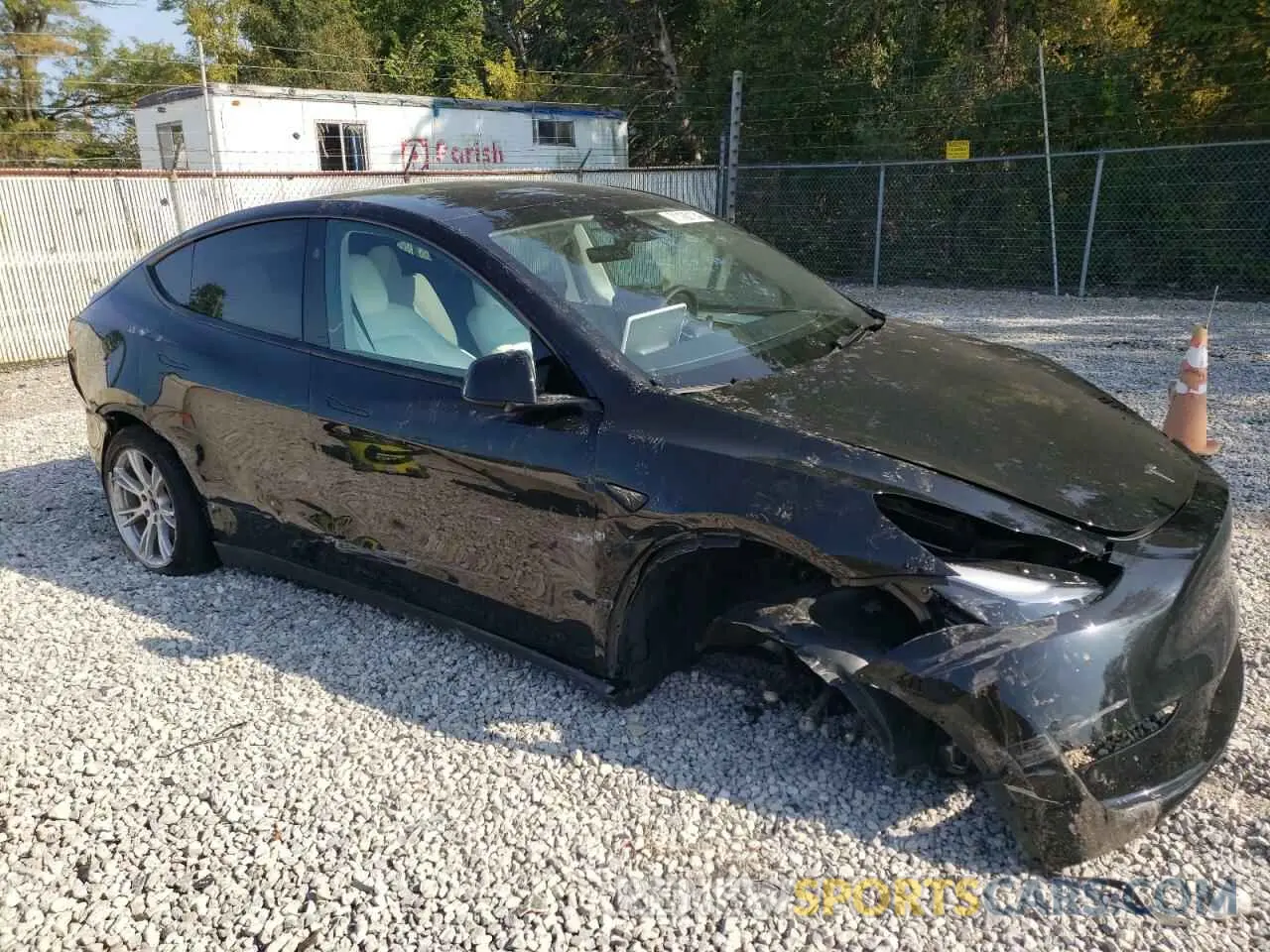 4 Photograph of a damaged car 7SAYGDEE4PF891600 TESLA MODEL Y 2023