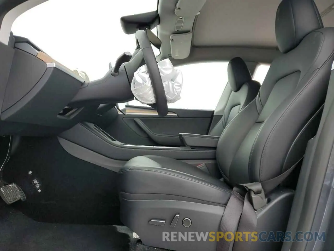 7 Photograph of a damaged car 7SAYGDEE5PA181019 TESLA MODEL Y 2023