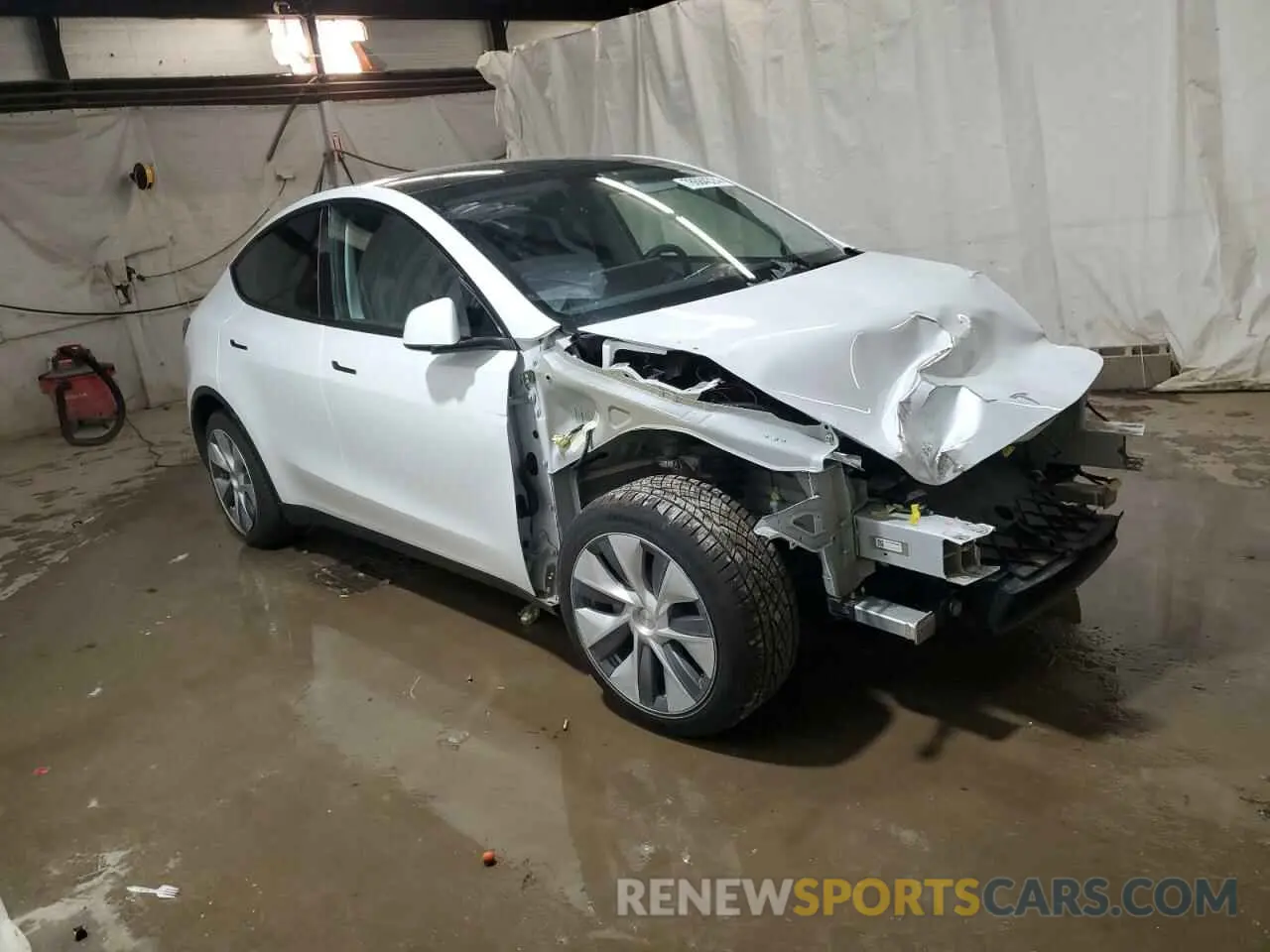 4 Photograph of a damaged car 7SAYGDEE7PA042302 TESLA MODEL Y 2023