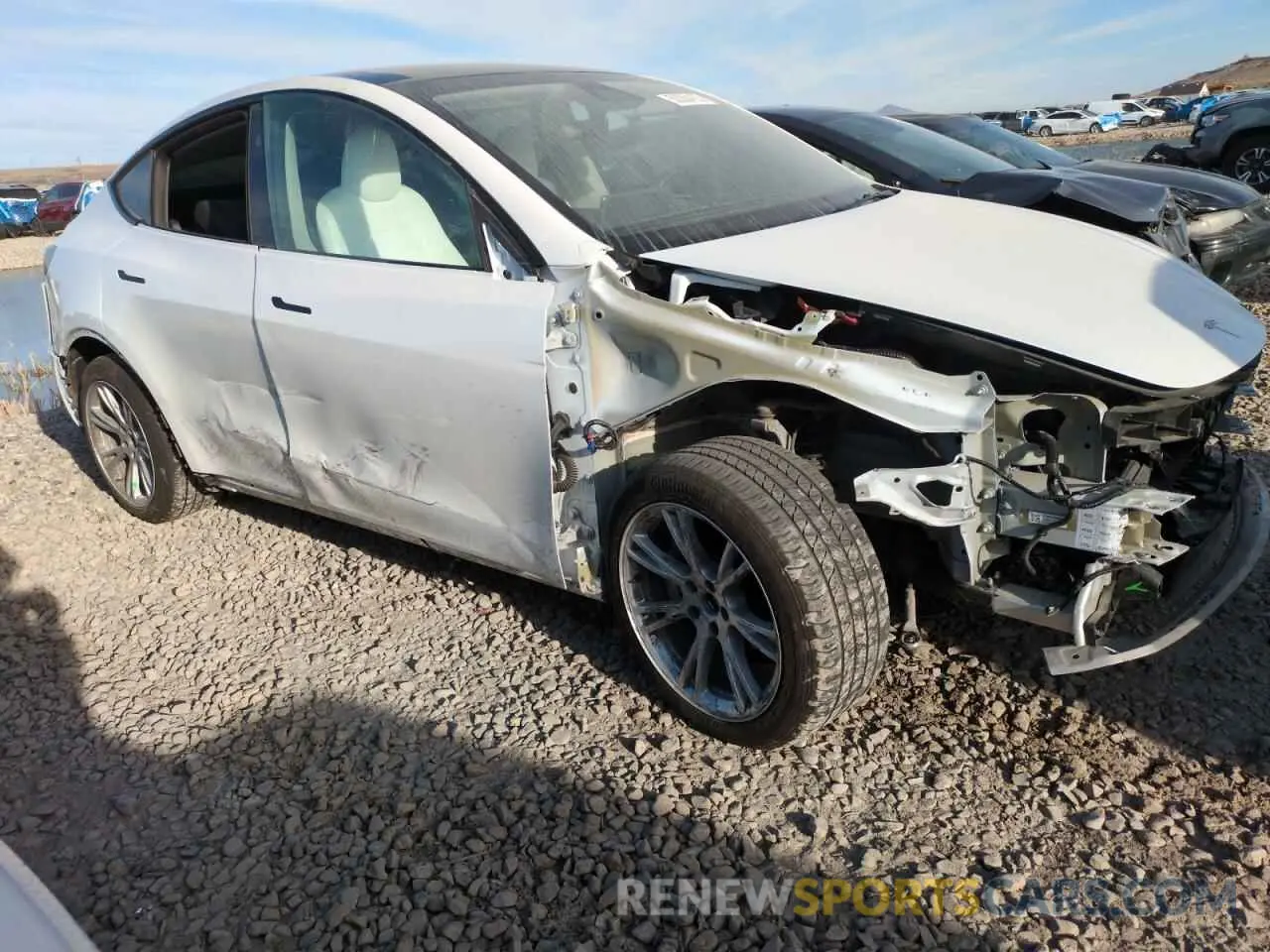4 Photograph of a damaged car 7SAYGDEE7PA123090 TESLA MODEL Y 2023