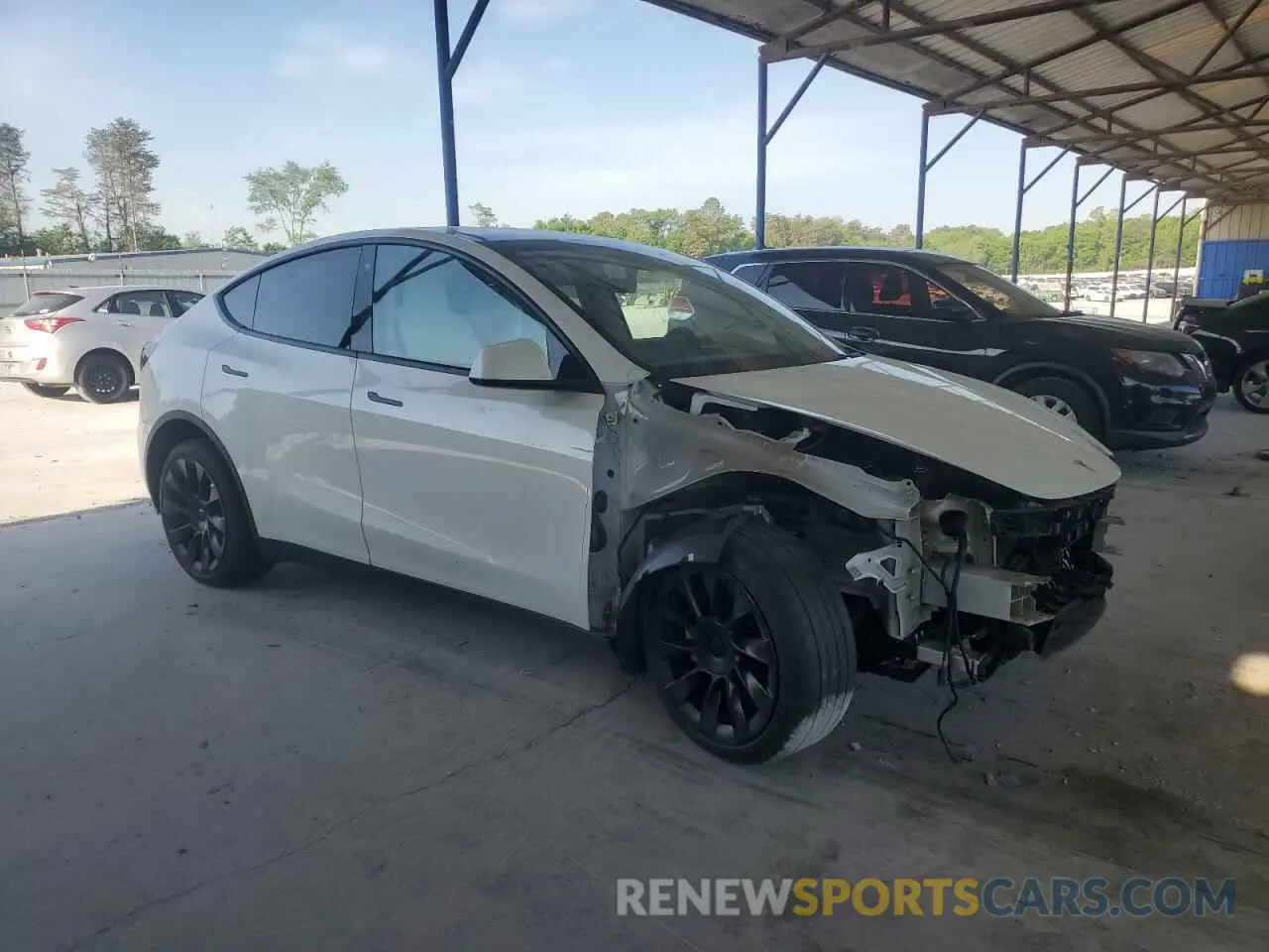 4 Фотография поврежденного автомобиля 7SAYGDEE7PF614925 TESLA MODEL Y 2023