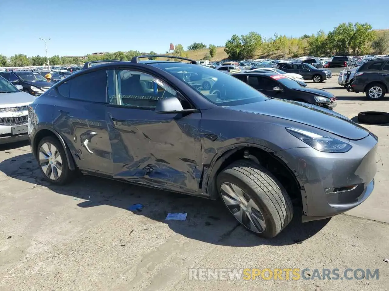 4 Photograph of a damaged car 7SAYGDEE7PF856100 TESLA MODEL Y 2023