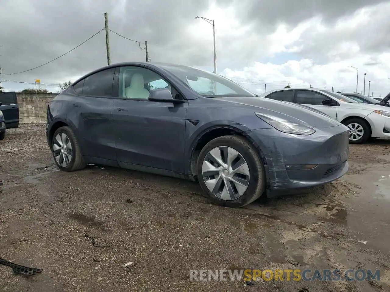 4 Photograph of a damaged car 7SAYGDEE8PF854503 TESLA MODEL Y 2023