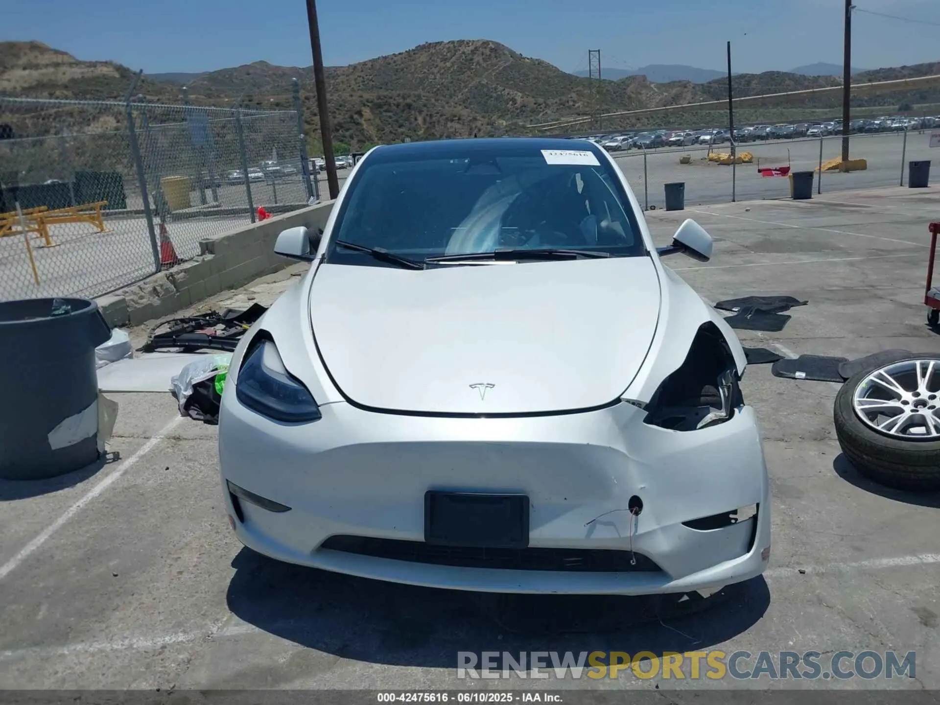 12 Photograph of a damaged car 7SAYGDEE9PF598470 TESLA MODEL Y 2023
