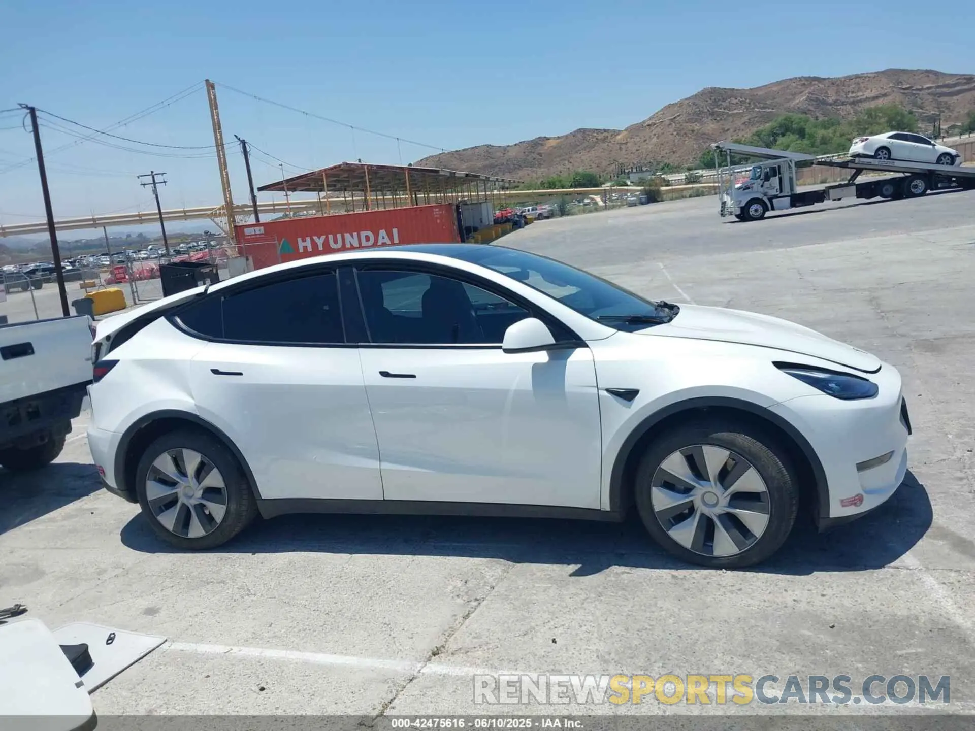 13 Photograph of a damaged car 7SAYGDEE9PF598470 TESLA MODEL Y 2023