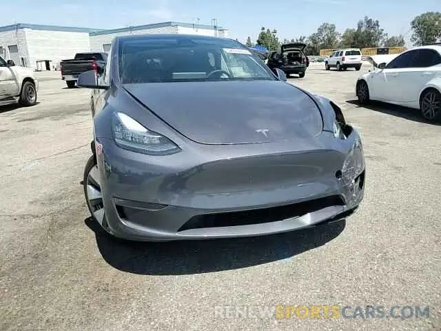 11 Photograph of a damaged car 7SAYGDEEXPA157332 TESLA MODEL Y 2023