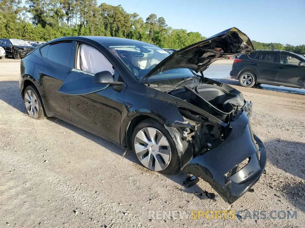 4 Photograph of a damaged car 7SAYGDEEXPA171831 TESLA MODEL Y 2023