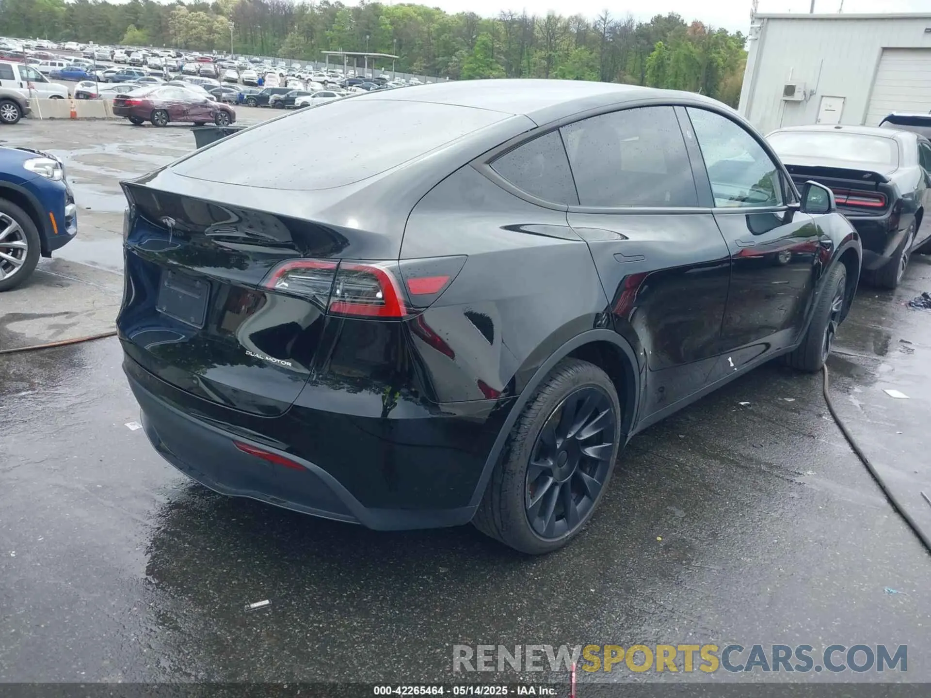 4 Photograph of a damaged car 7SAYGDEEXPA183123 TESLA MODEL Y 2023