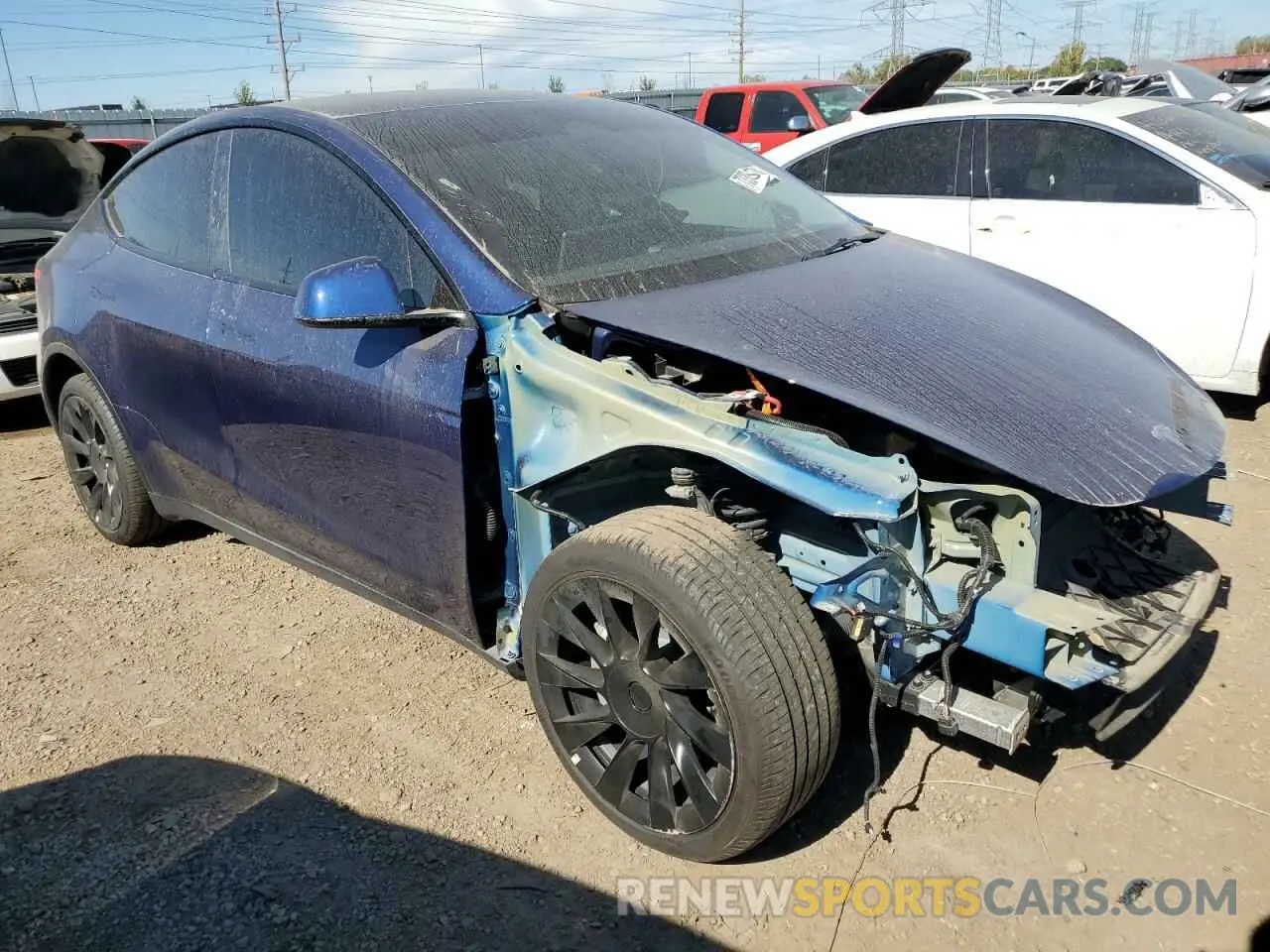 4 Photograph of a damaged car 7SAYGDEEXPF695208 TESLA MODEL Y 2023