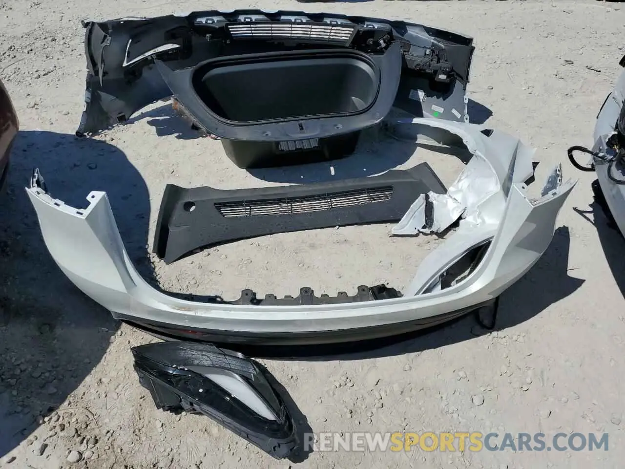 12 Photograph of a damaged car 7SAYGDEEXPF770800 TESLA MODEL Y 2023