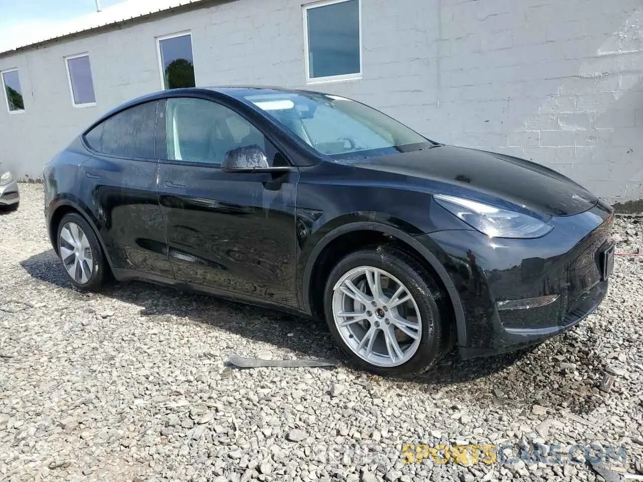 4 Photograph of a damaged car 7SAYGDEEXPF827903 TESLA MODEL Y 2023