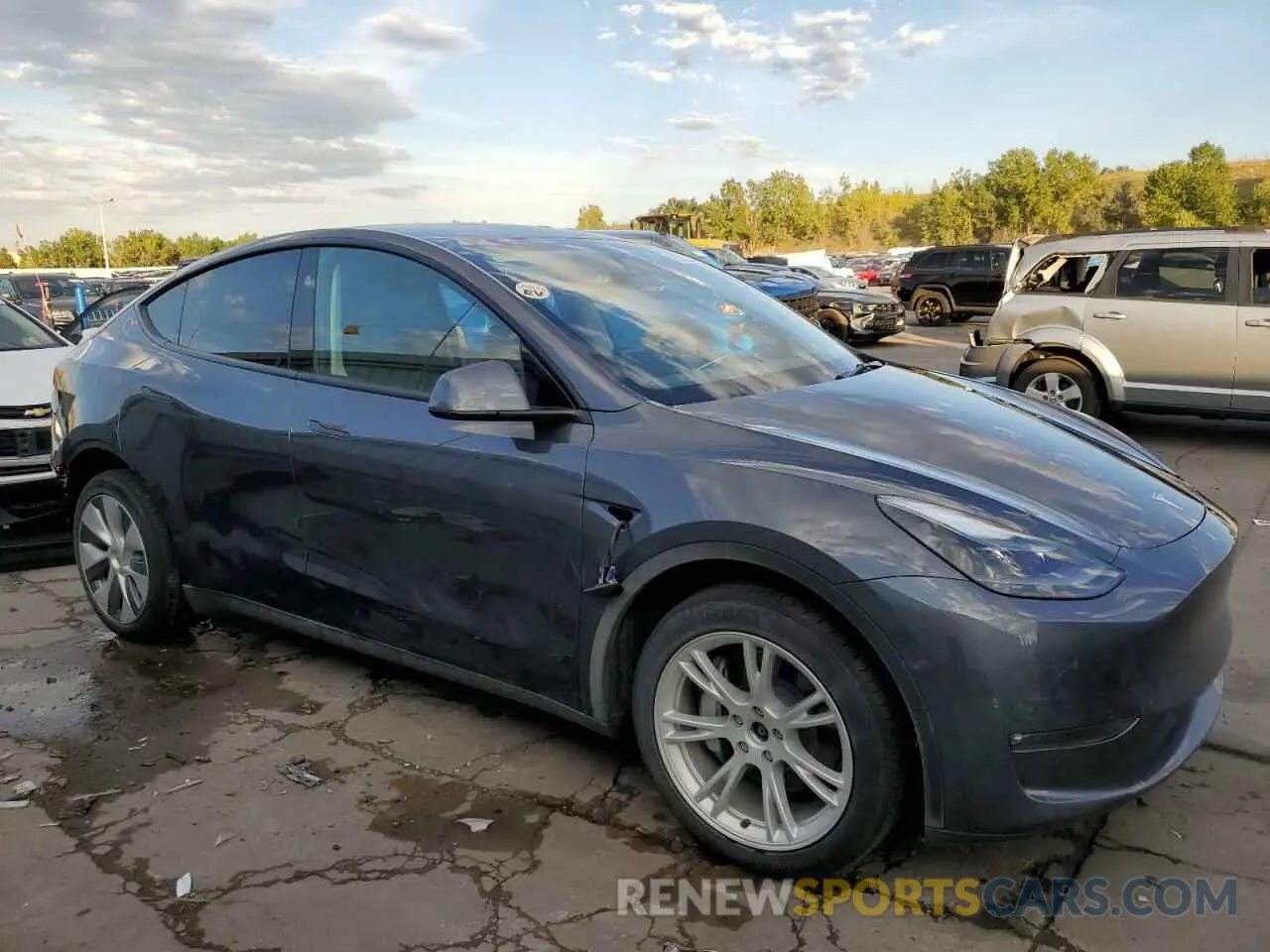 4 Photograph of a damaged car 7SAYGDEEXPF908951 TESLA MODEL Y 2023