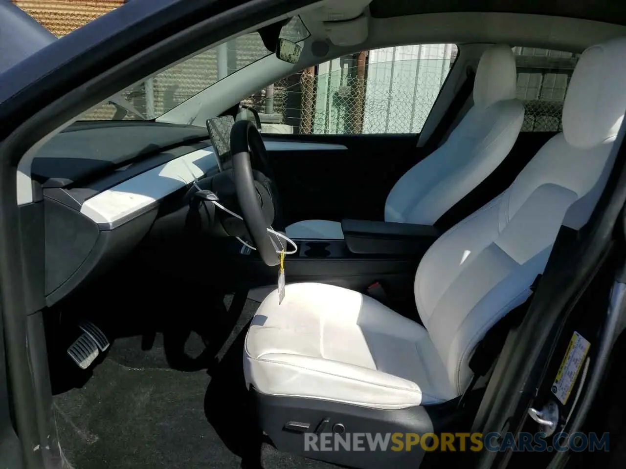 7 Photograph of a damaged car 7SAYGDEF0PF915030 TESLA MODEL Y 2023