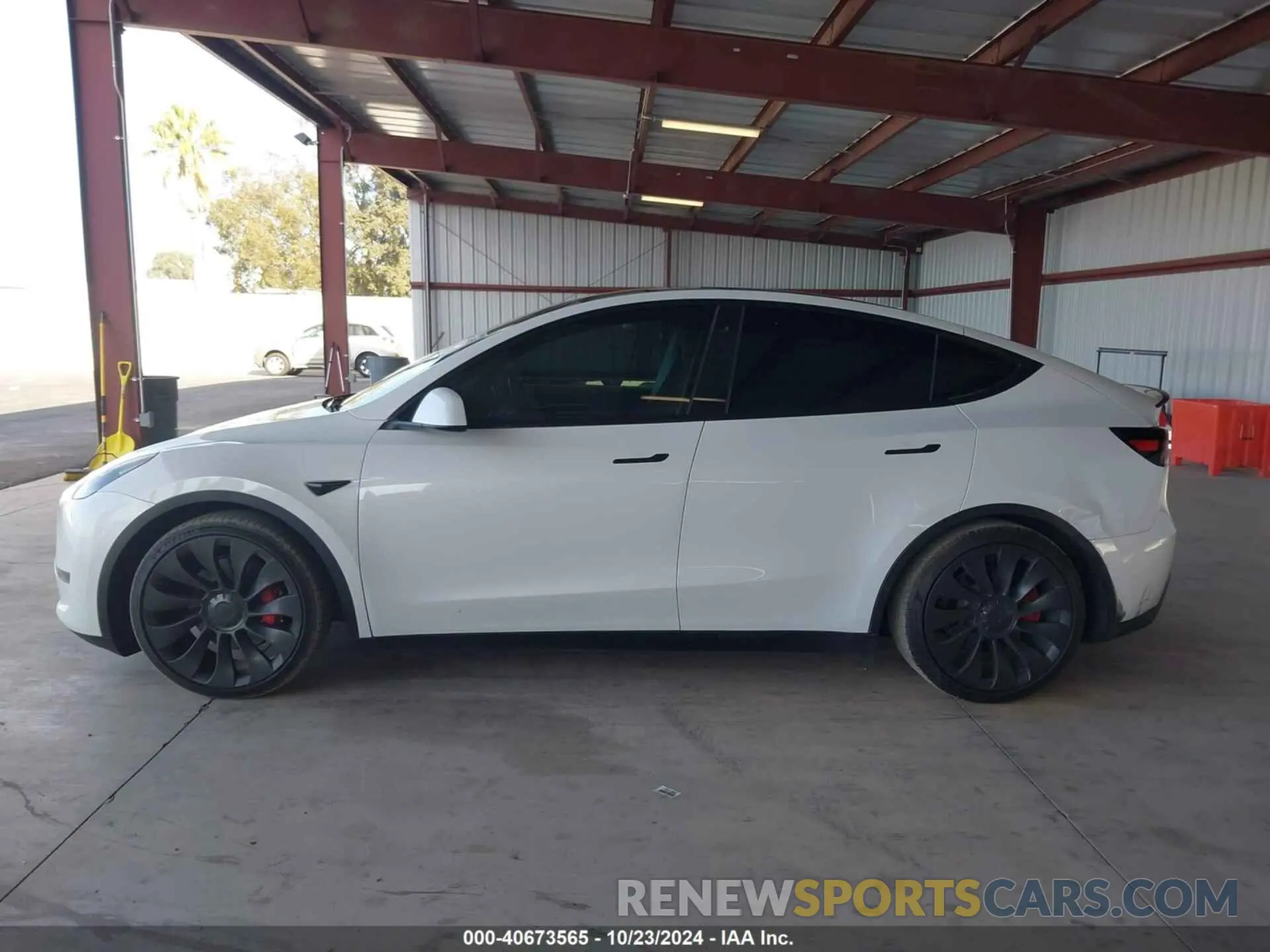14 Photograph of a damaged car 7SAYGDEF8PF740641 TESLA MODEL Y 2023