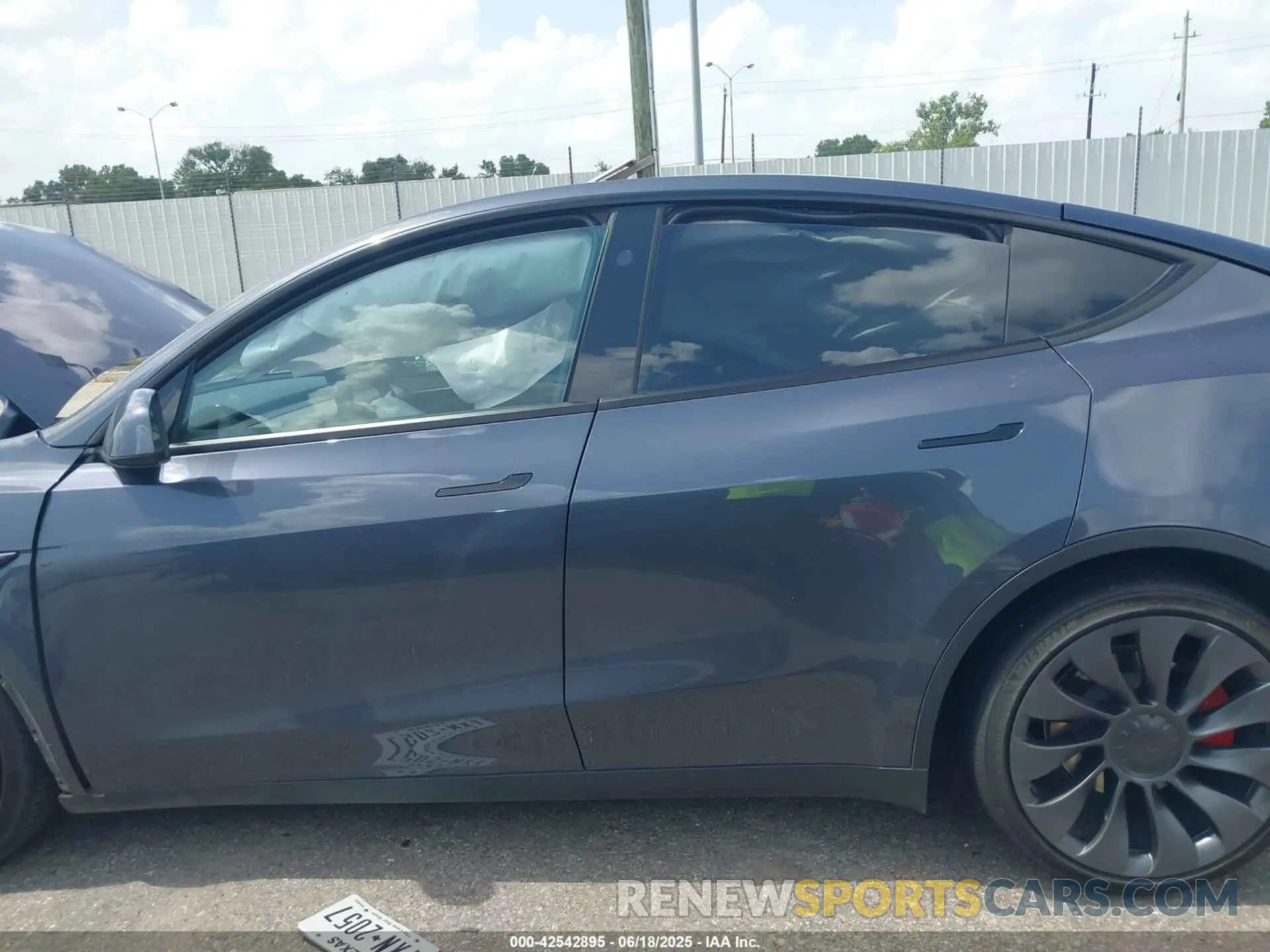 13 Photograph of a damaged car 7SAYGDEF9PF940492 TESLA MODEL Y 2023