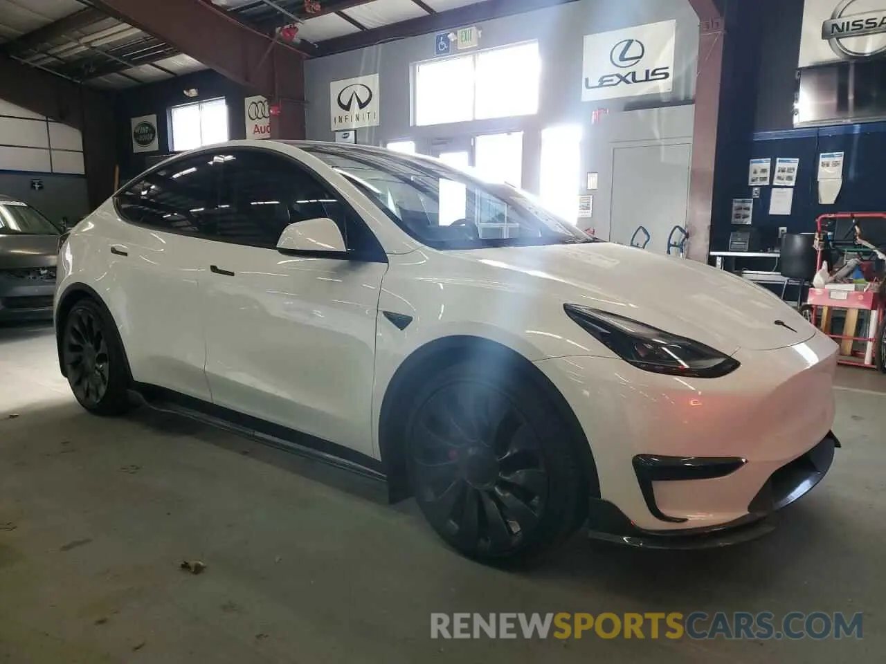 4 Photograph of a damaged car 7SAYGDEFXPF777075 TESLA MODEL Y 2023