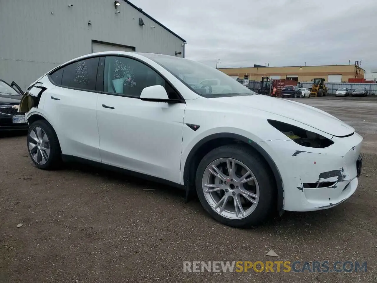 4 Photograph of a damaged car LRWYGDFD5PC901807 TESLA MODEL Y 2023