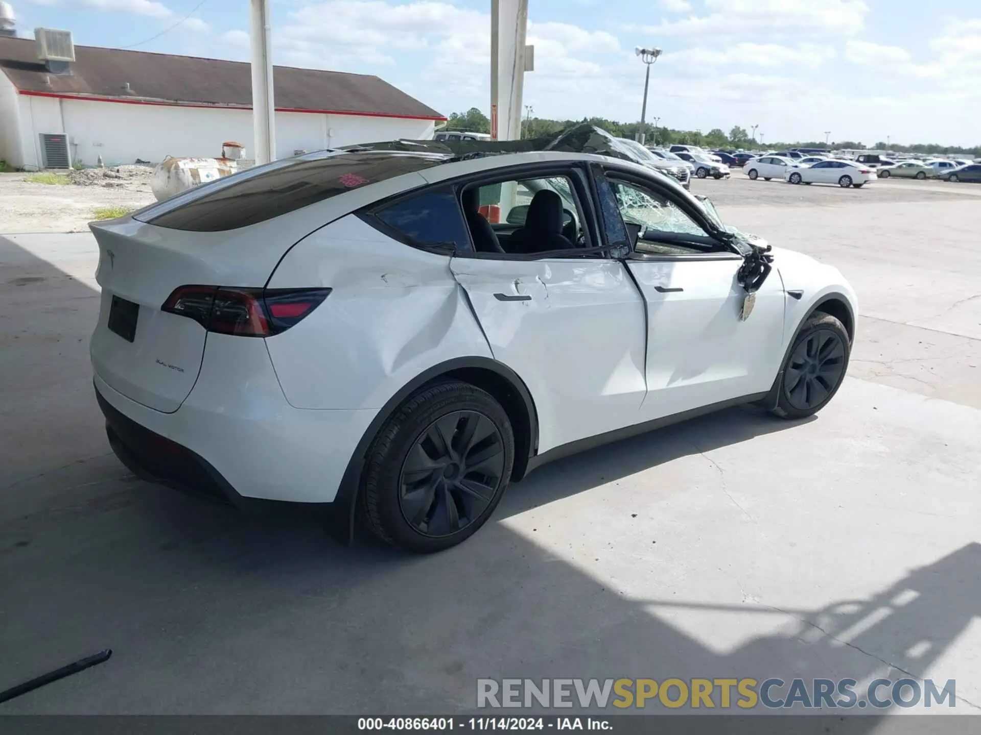 4 Photograph of a damaged car 7SAYGAEE0RF100657 TESLA MODEL Y 2024