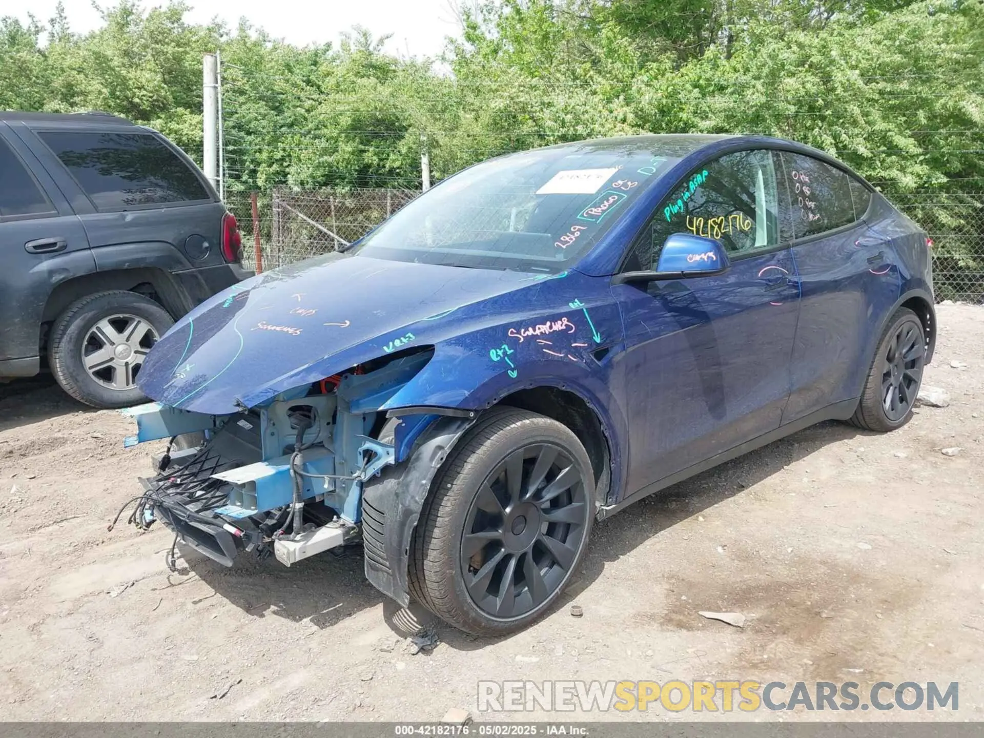 6 Photograph of a damaged car 7SAYGAEE0RF212018 TESLA MODEL Y 2024