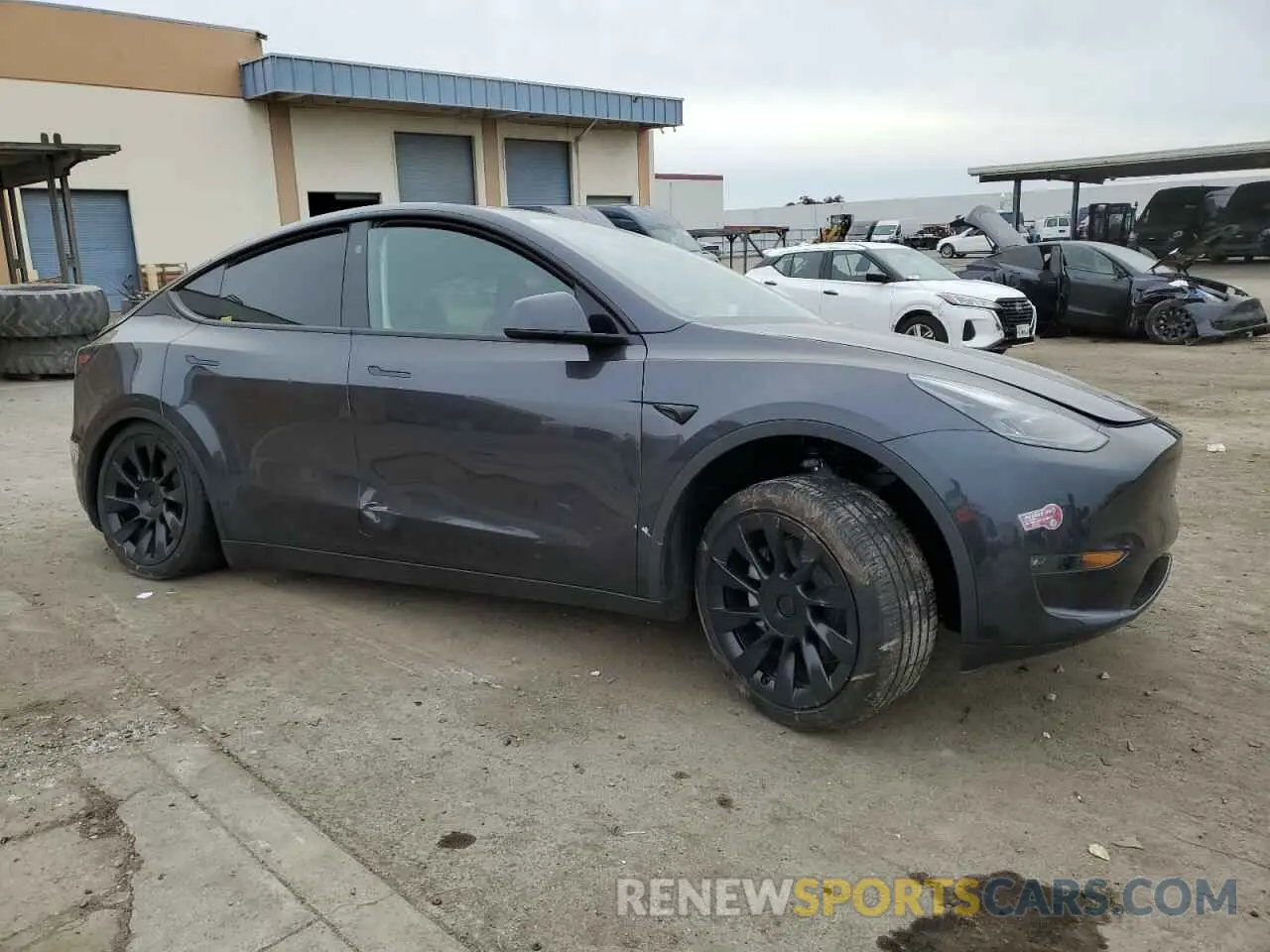 4 Photograph of a damaged car 7SAYGAEE1RF082203 TESLA MODEL Y 2024