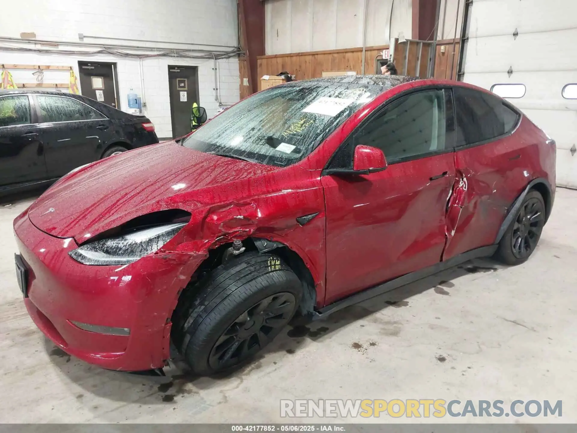 6 Photograph of a damaged car 7SAYGAEE2RF986206 TESLA MODEL Y 2024