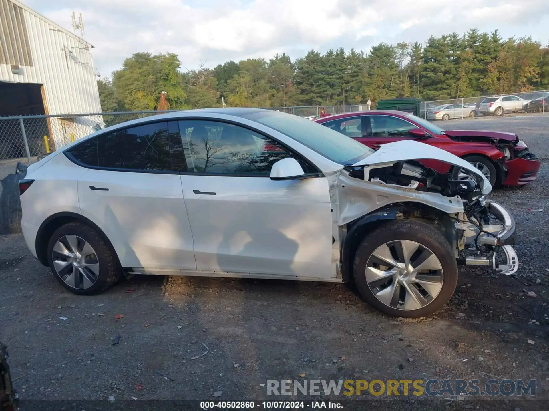13 Photograph of a damaged car 7SAYGAEE8RF092274 TESLA MODEL Y 2024