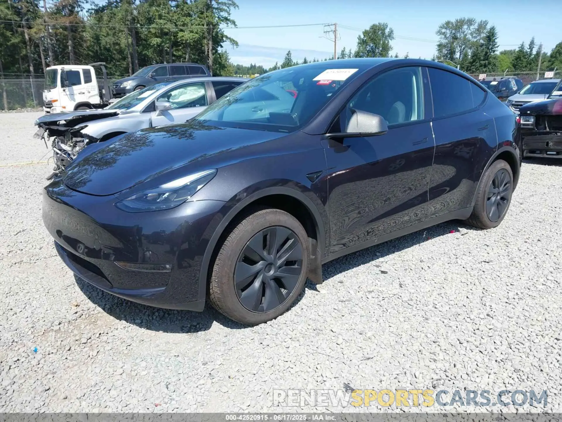 2 Photograph of a damaged car 7SAYGAEEXRF180212 TESLA MODEL Y 2024