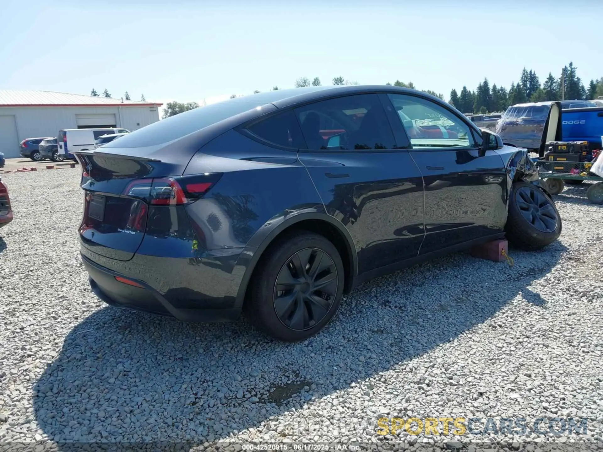 4 Photograph of a damaged car 7SAYGAEEXRF180212 TESLA MODEL Y 2024