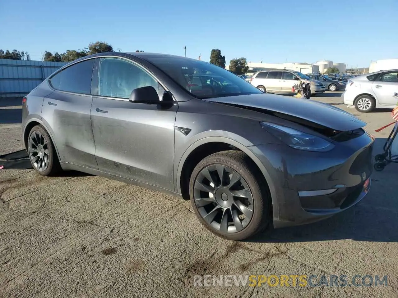 4 Photograph of a damaged car 7SAYGDED0RF040677 TESLA MODEL Y 2024