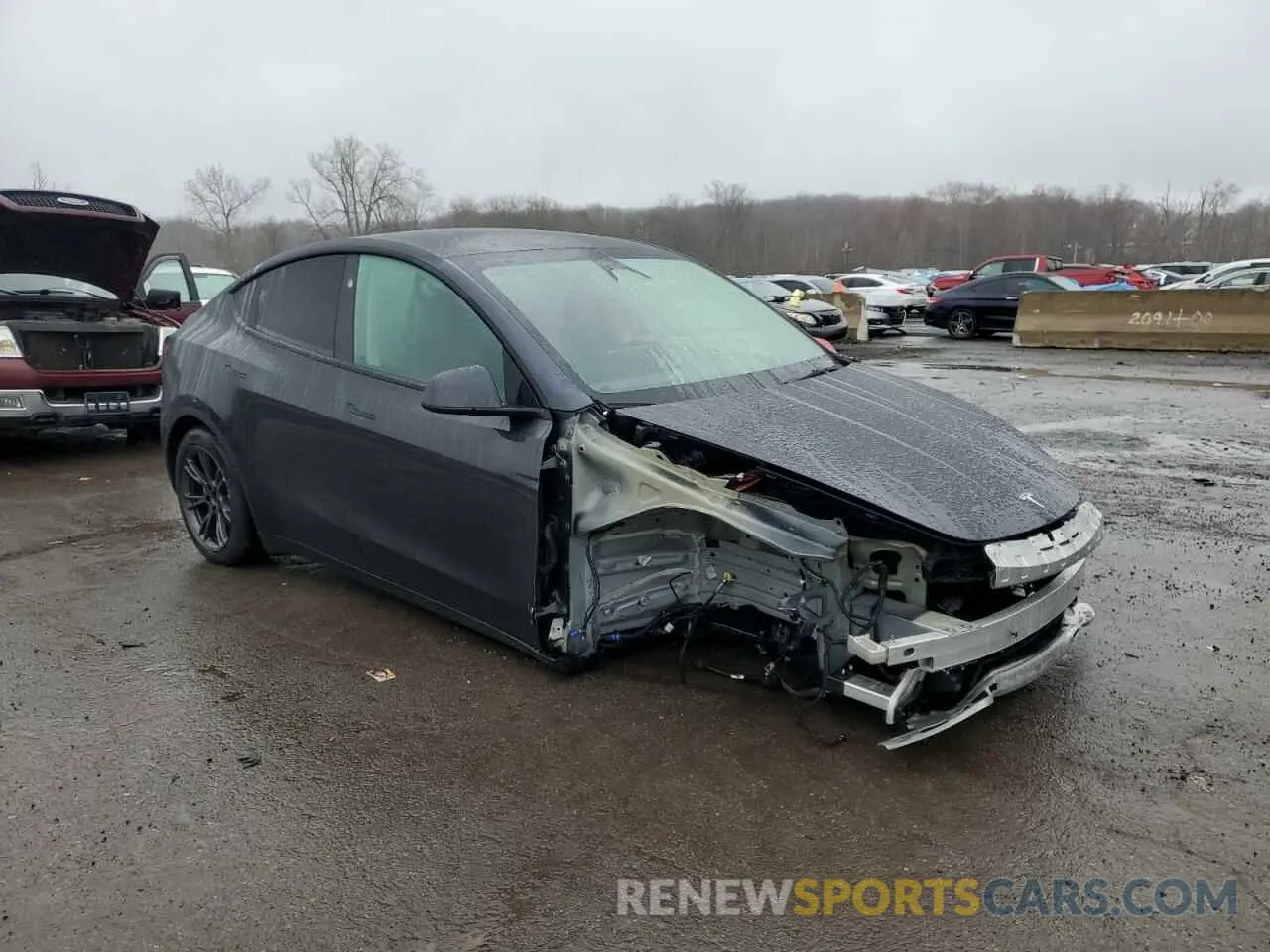 4 Photograph of a damaged car 7SAYGDED0RF165260 TESLA MODEL Y 2024
