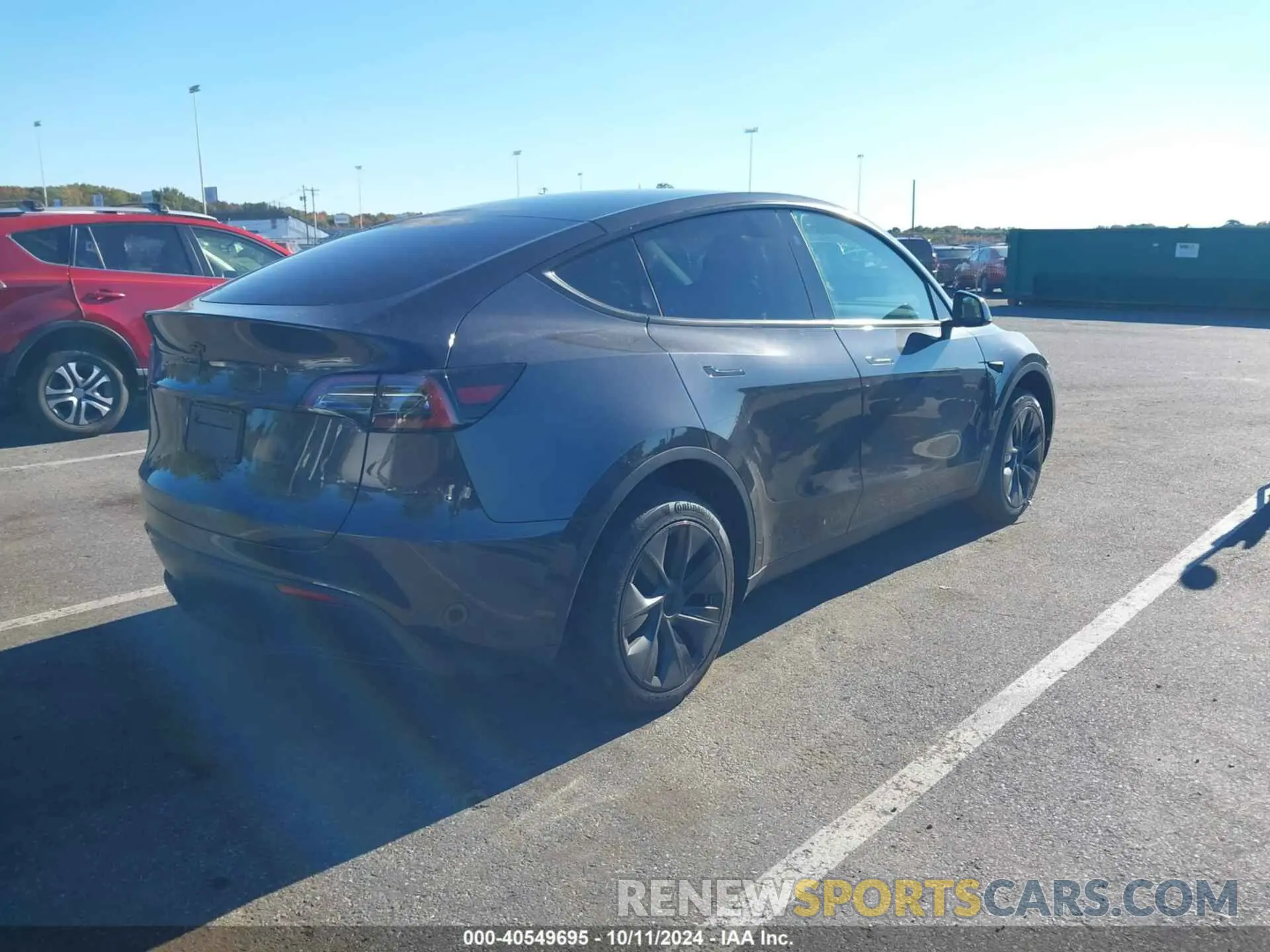 4 Photograph of a damaged car 7SAYGDED0RF178607 TESLA MODEL Y 2024