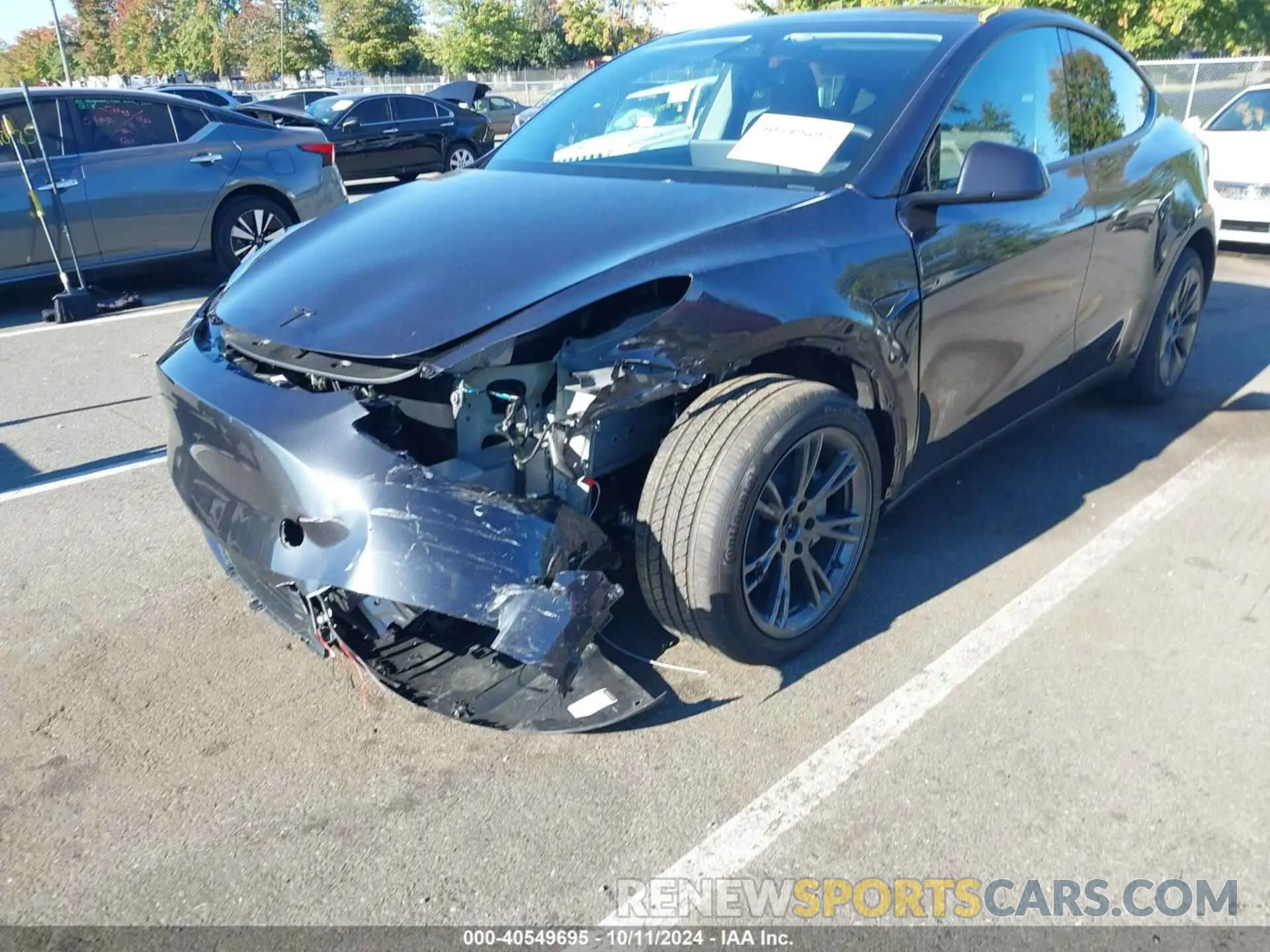 6 Photograph of a damaged car 7SAYGDED0RF178607 TESLA MODEL Y 2024