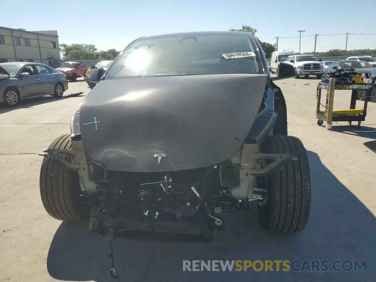 5 Photograph of a damaged car 7SAYGDED1RA305765 TESLA MODEL Y 2024