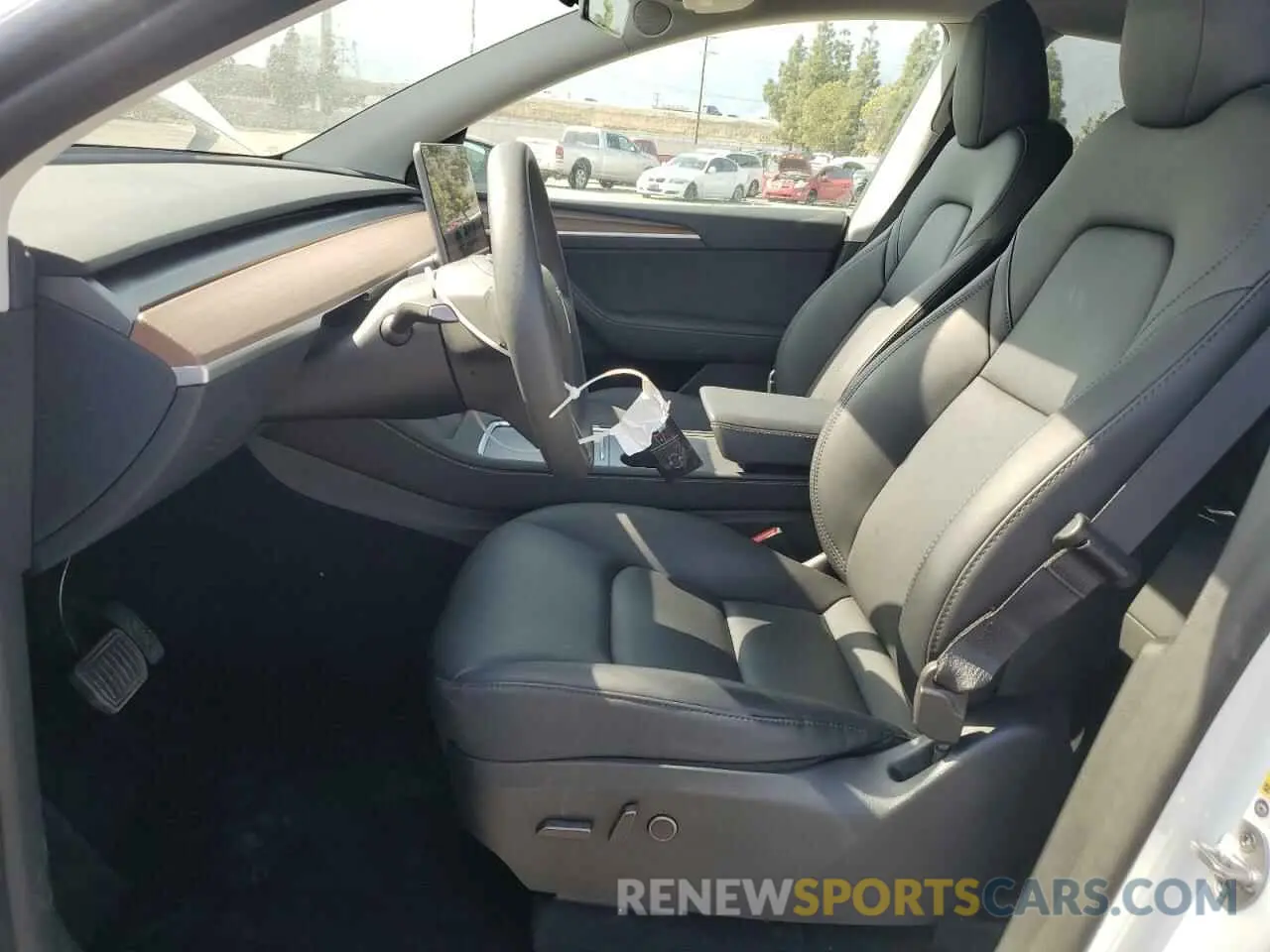 7 Photograph of a damaged car 7SAYGDED1RF002570 TESLA MODEL Y 2024