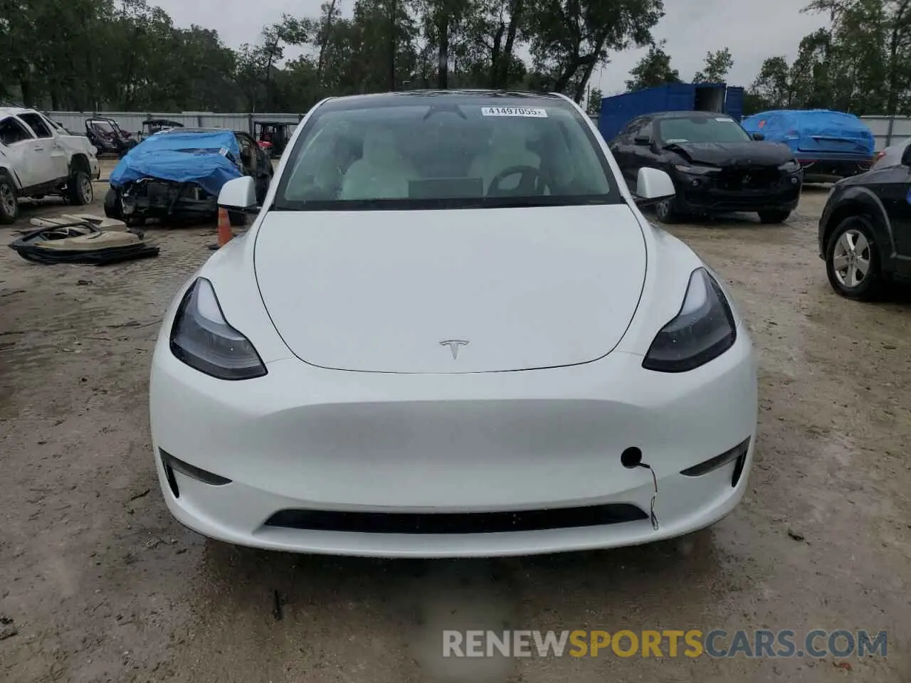 5 Photograph of a damaged car 7SAYGDED1RF095042 TESLA MODEL Y 2024