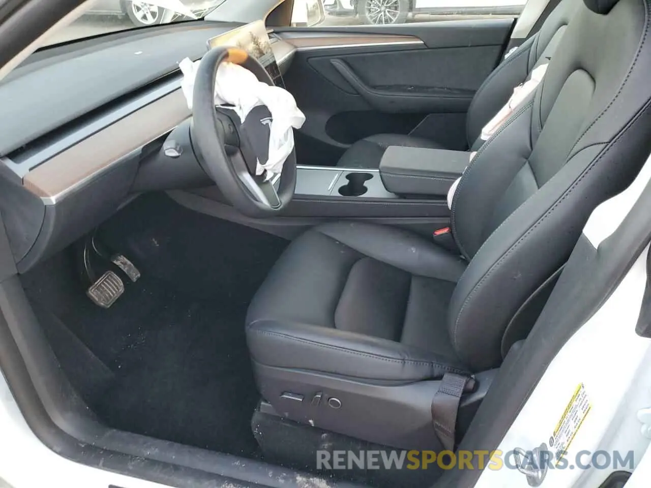 7 Photograph of a damaged car 7SAYGDED1RF125365 TESLA MODEL Y 2024