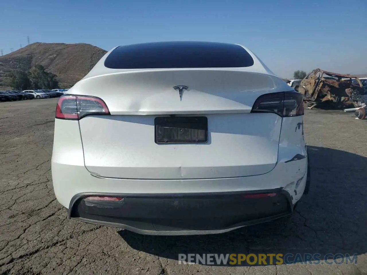 6 Photograph of a damaged car 7SAYGDED1RF212974 TESLA MODEL Y 2024