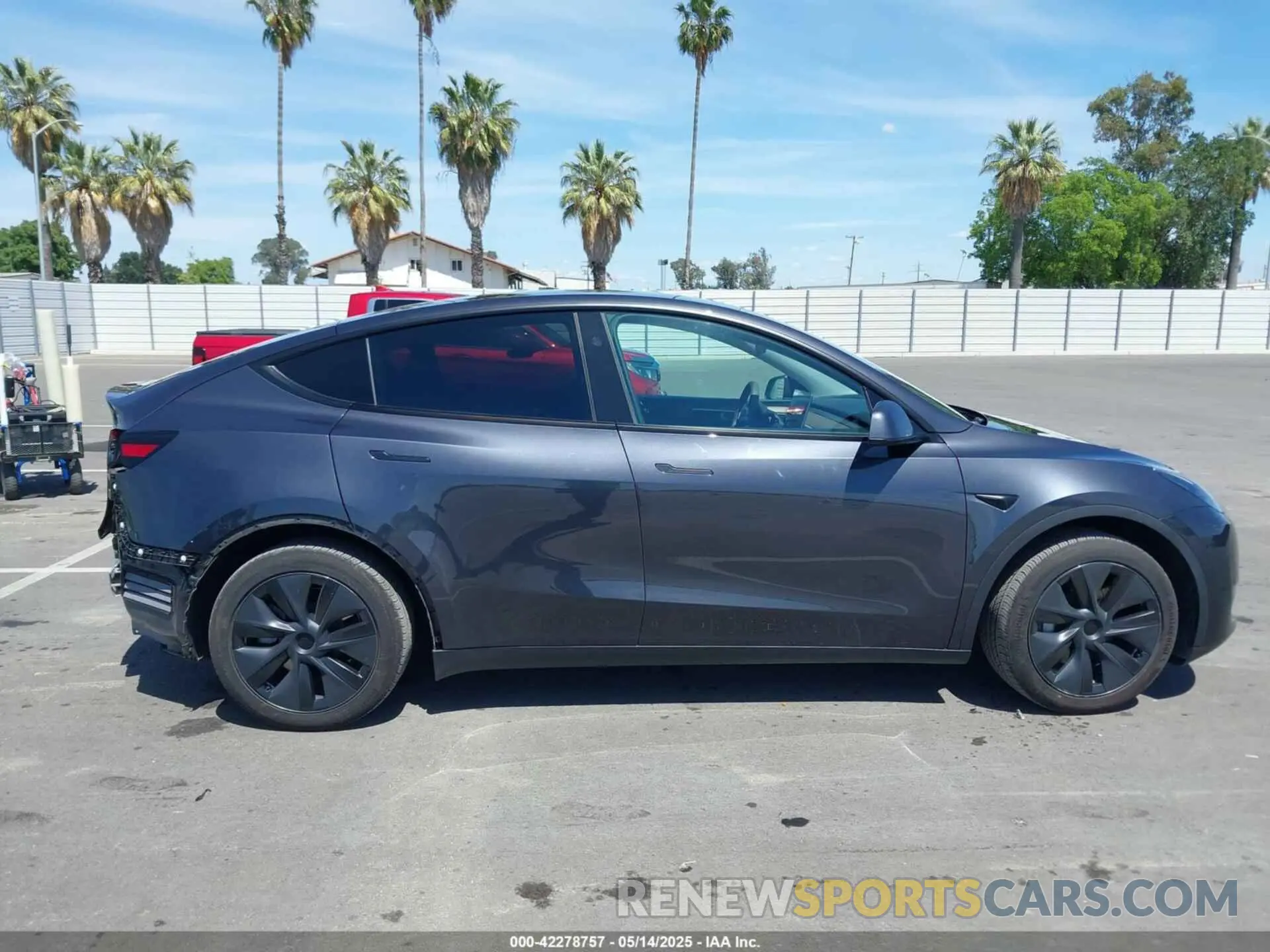 14 Photograph of a damaged car 7SAYGDED2RF102144 TESLA MODEL Y 2024