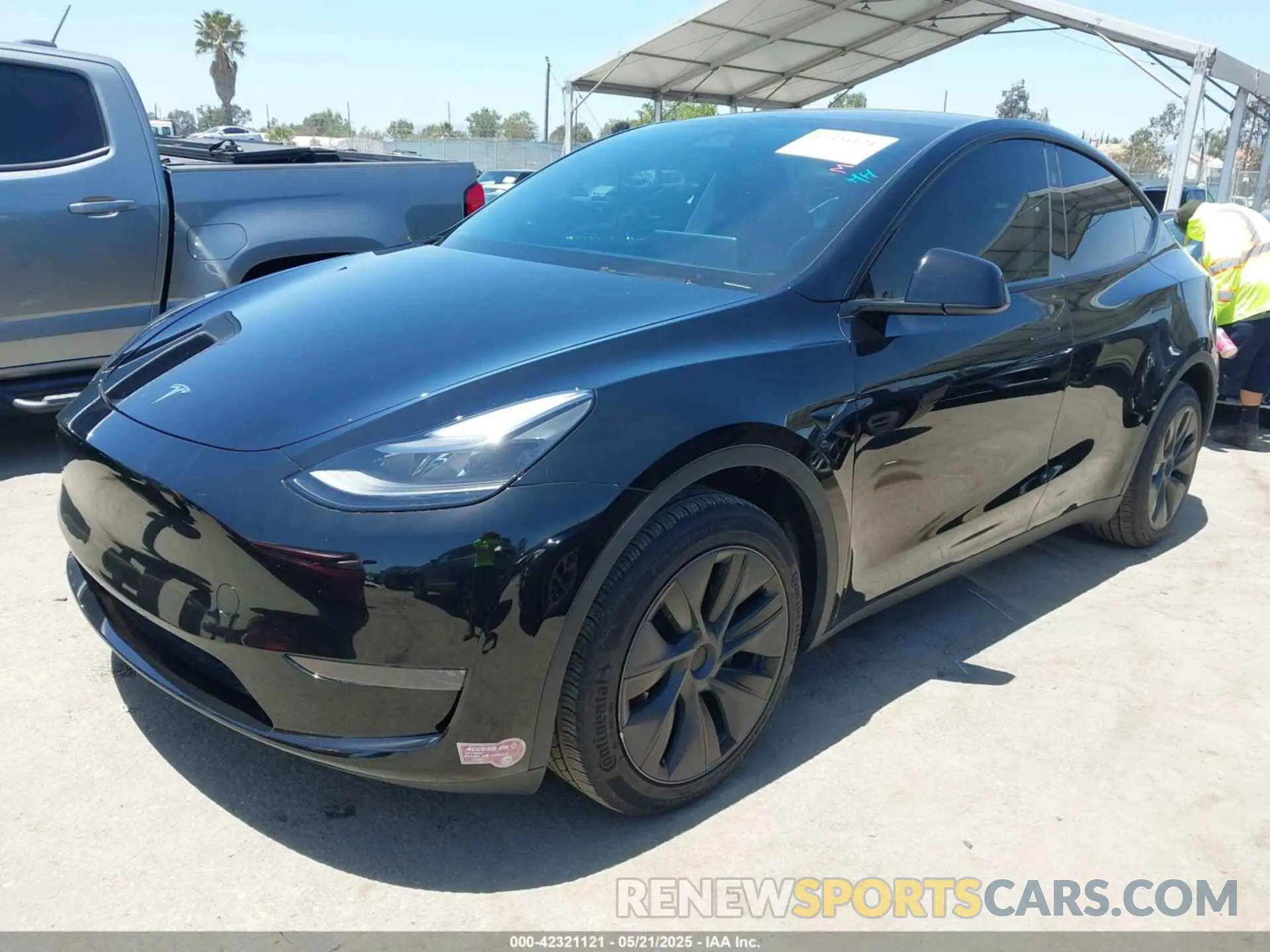 2 Photograph of a damaged car 7SAYGDED2RF111670 TESLA MODEL Y 2024