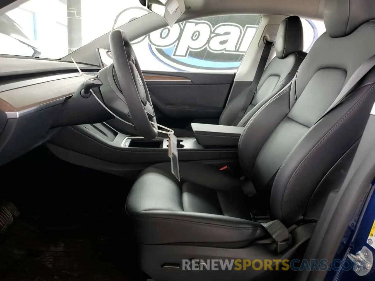 7 Photograph of a damaged car 7SAYGDED2RF119770 TESLA MODEL Y 2024