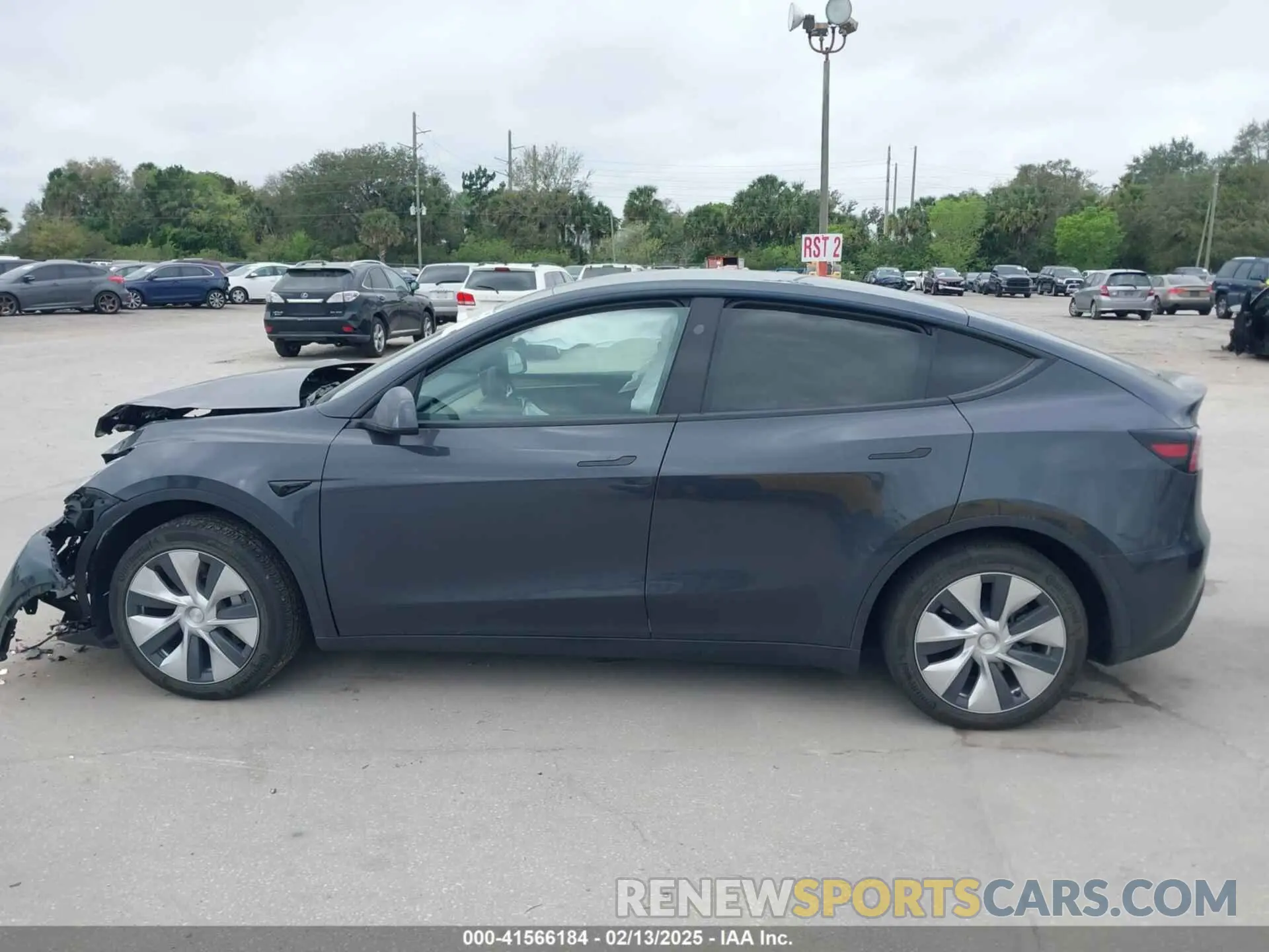 13 Photograph of a damaged car 7SAYGDED3RF002246 TESLA MODEL Y 2024