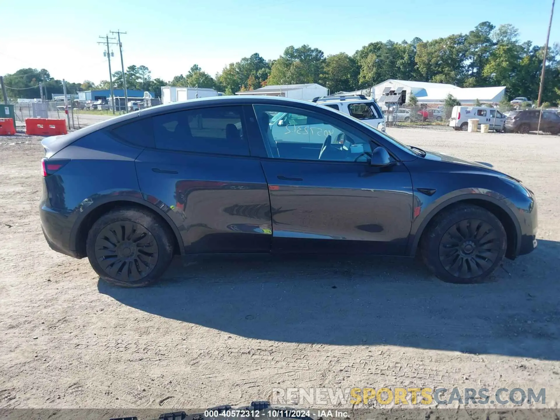 12 Photograph of a damaged car 7SAYGDED3RF092501 TESLA MODEL Y 2024