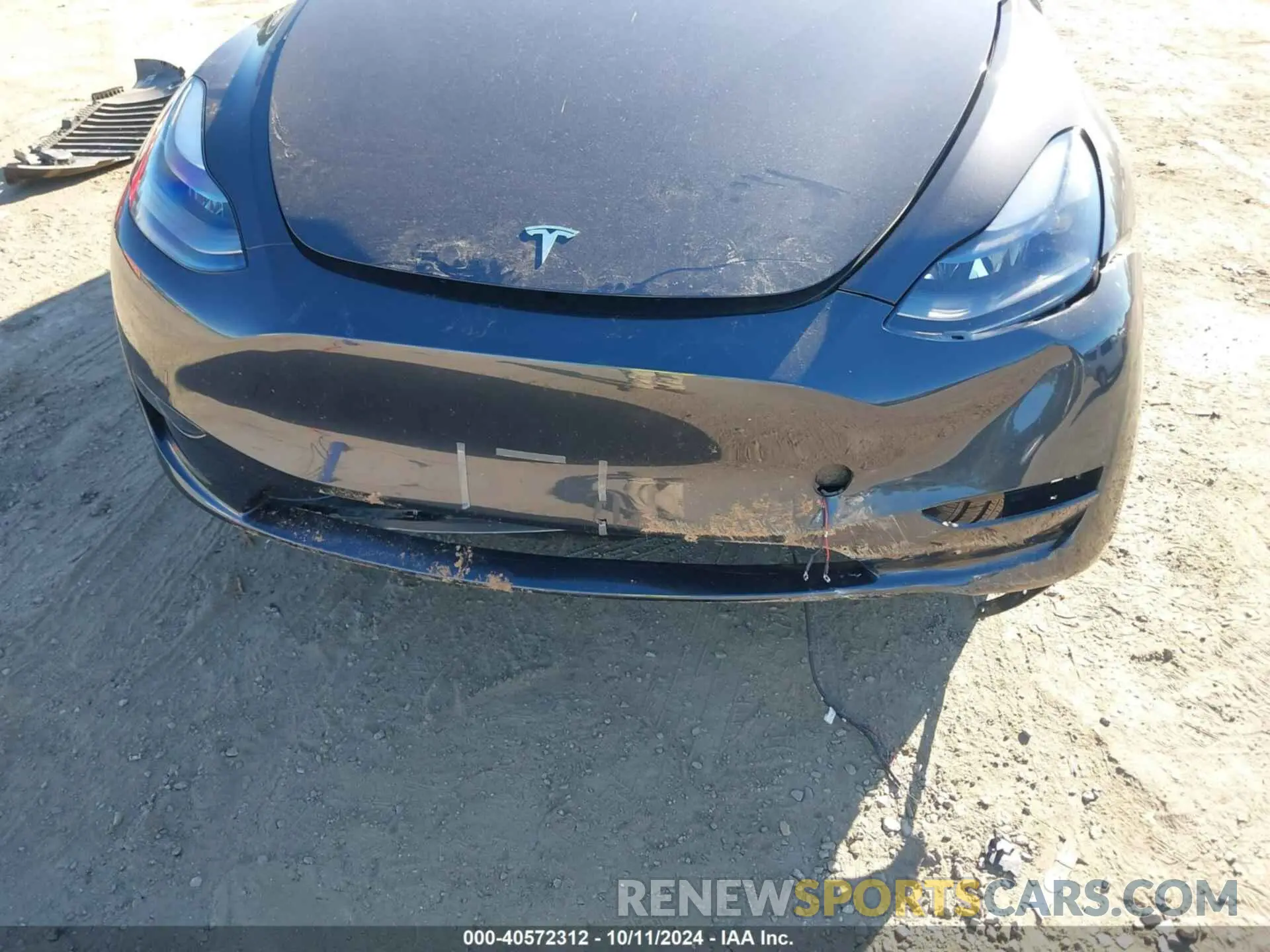 6 Photograph of a damaged car 7SAYGDED3RF092501 TESLA MODEL Y 2024