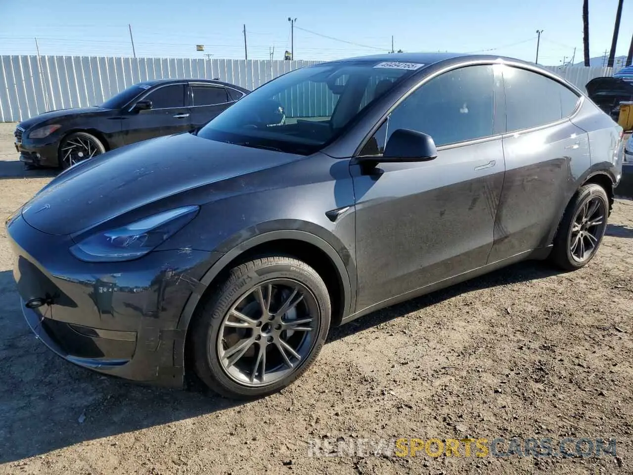 1 Photograph of a damaged car 7SAYGDED3RF151031 TESLA MODEL Y 2024