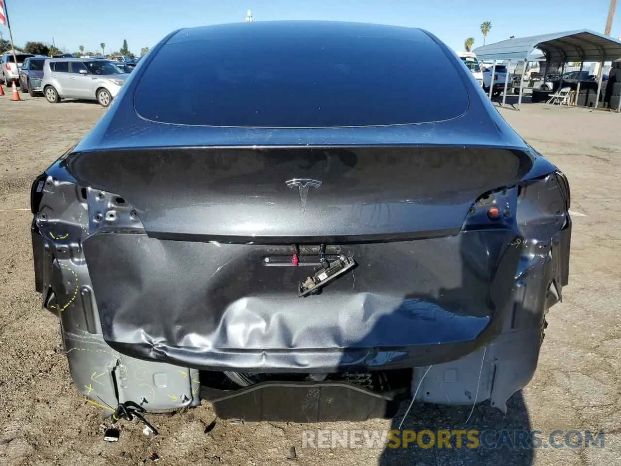 6 Photograph of a damaged car 7SAYGDED3RF151031 TESLA MODEL Y 2024