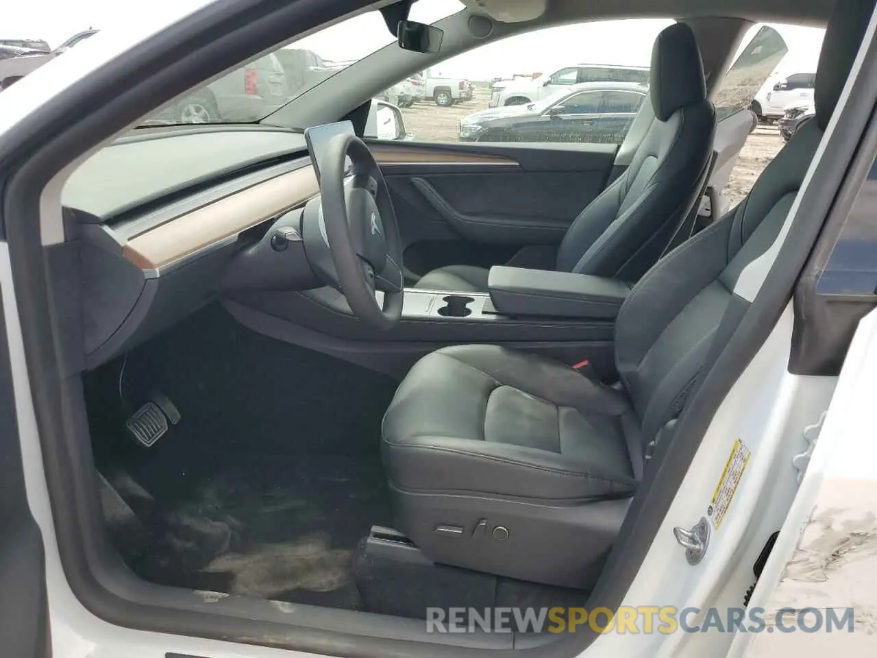 7 Photograph of a damaged car 7SAYGDED4RF068286 TESLA MODEL Y 2024