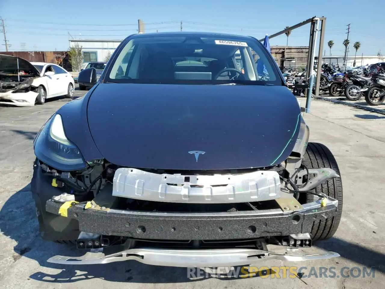 5 Photograph of a damaged car 7SAYGDED4RF113579 TESLA MODEL Y 2024